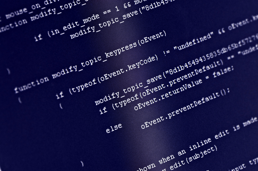 Computer screen with programming code displayed.